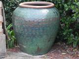 ONE OF MANY JARDINAIRES OF DIFFERENT TYPES AND COLORS BOTH GLAZED AND UNGLAZED.
