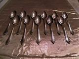 SET OF STERLING SILVER DEMITASSE SPOONS