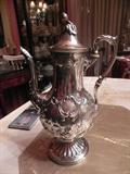 HIGHLY EMBOSSED STERLING SILVER COFFEE POT BY H.E. BALDWIN, NEW ORLEANS