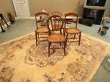 GROUP OF EARLY CHAIRS ON ONE OF MANY ORIENTAL CARPETS