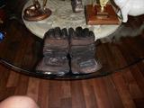 ONE OF SEVERAL PAIRS OF MOTORCYCLE GLOVES