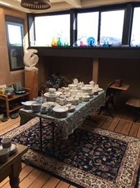 Dozens of sets of vintage dishes