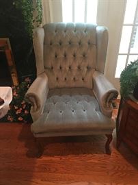 Vintage, tufted wing backed chair-have two of these that match.  View of round wood occasional table topwith marble to the right.  Have two of these as well.