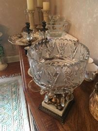 Vintage collectible glass bowl with chandelier glass on a study base.