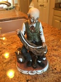 Collectible old man tailor figurine