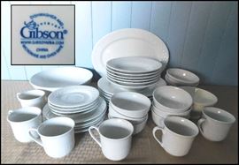 Set of 39 pieces of white Gibson china with basket weave pattern