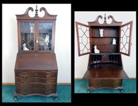 Vintage mahogany drop front secretary with china cabinet top with claw feet