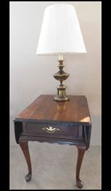 Brass lamp with shade on Ethan Allen drop leaf end table measuring 21" x 27" x 23" and when opened it is 36" x 27" x 23"