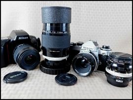 Nikon cameras and Nikor lenses. 180mm and 28mm