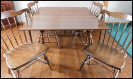 Solid cherry drop leaf gate leg dining table with two leafs with four solid cherry plank seat early American style chairs