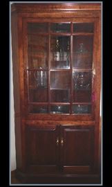 Two of two custom built large solid cherry corner china cabinets