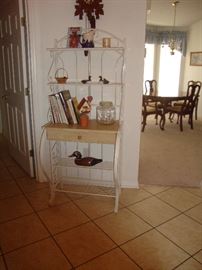 White iron baker's rack, wood shelf with drawer