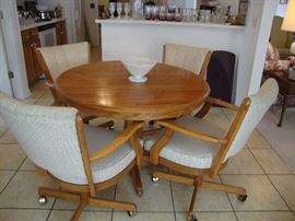 Oak Dinette set, 1 leaf, 4 upholstered chairs. Like new condition.