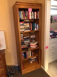 Book shelf and tons of current paper backs