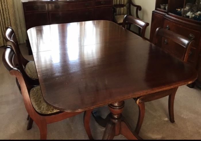 Mahogany Dining Room Table with 6 Chairs.  Two leaves and Protective Cover Matt.