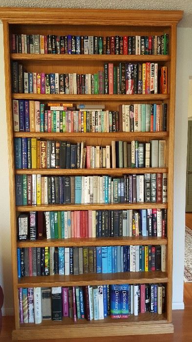 Huge solid oak bookcase perfect for books, movies or collectibles 
