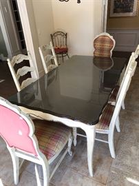 French provincial glass top kitchen table with 6 chairs.