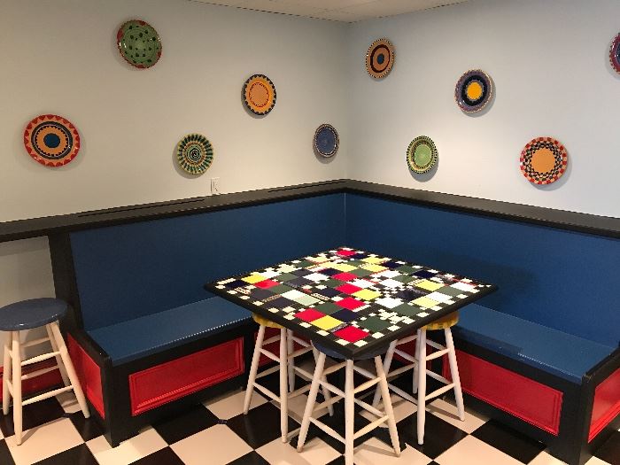 Handmade mosaic table with handpainted stools. Also pictured: handpainted dec. plates.
