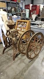 LARGE Coffee Grinder. the wheel grinder sits on top of the base. Very Cool!!!
this is offsite consignment call for appointment 
steve214-240-1435
john214-683-2962