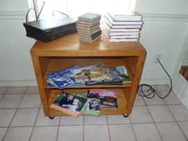 Roll around cabinet + VCR + Books