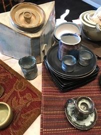 Several pieces of one-of-a-kind pottery.