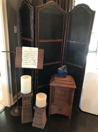 Antique music stand, room divider and wicker candle holders.