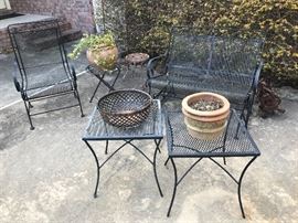Iron chair and glider set with matching side tables. 