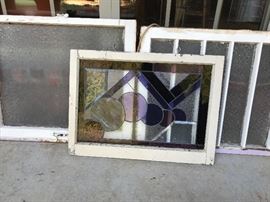Very unique stained glass window and 2 other vintage windows. 