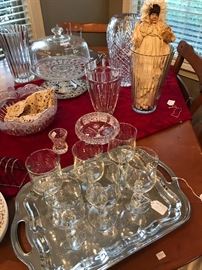 Lots of stemware to select from.  Found this old antique doll packed away.