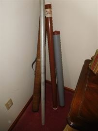 Vintage fishing rods in cases