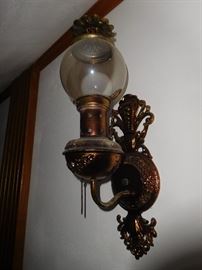 There are 4 of these ornate wall sconces