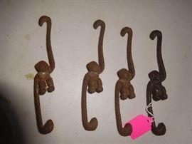 Cast iron monkey hangers