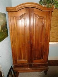 *Consignment piece not located on sight: Vintage solid teak double door armoire with bottom drawers. 81" x 43" x 28" deep... This armoire can be purchased in advance...$350