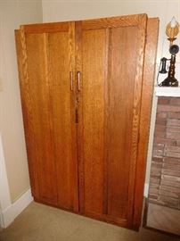 *Consignment piece not located on sight: Vintage Mission solid oak double door armoire with inside mirror.  73" x 48" x 22" deep... This armoire can be purchased in advance...$350