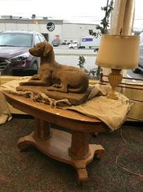 large concrete statuary, wood table & lamps