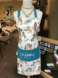 Dog themed aprons, magnets for fridge and car, tea towels & more
