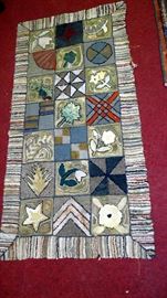 several nice old hooked rugs