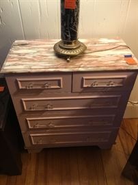 Pink marble top chest of drawers