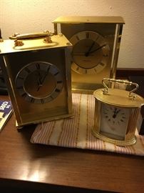 Three carriage clocks