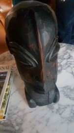 Hand carved about a foot tall