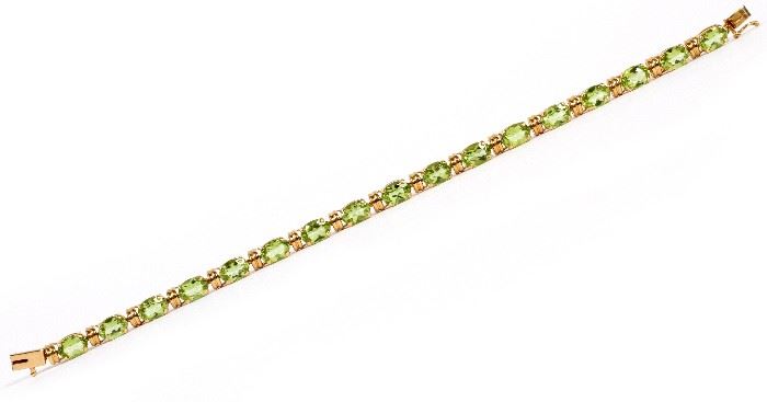 #1092 - 15CT NATURAL GREEN PERIDOT AND 14KT YELLOW GOLD BRACELET, L 6 3/4"