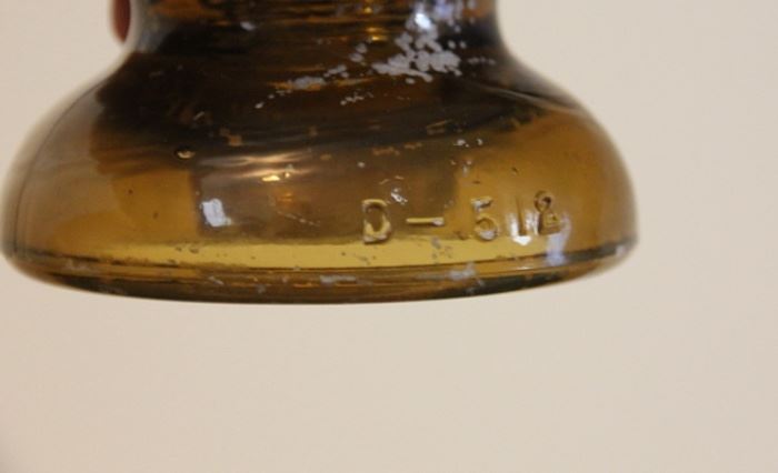 amber colored glass insulator