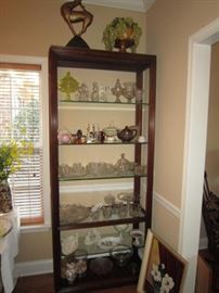 Tall etagere with glass shelves