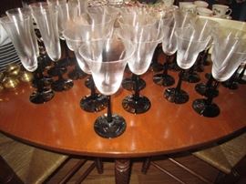 Stemware-Swirl cups with black base and stem. 7 flutes, 7 waters, 7 wines, 7 sherries