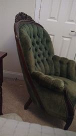 Detail of wood trim carried down side of chair