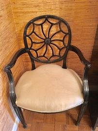 Six black lacquer spider back chairs