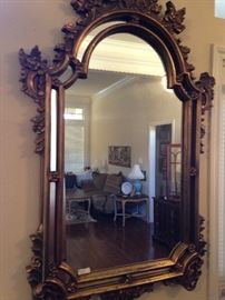 One of several ornate mirrors