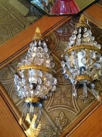 Gold and crystal sconces