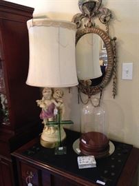 Vintage lamp; oval mirror; domed bell jar display with wooden base