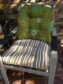 One of two matching patio chairs